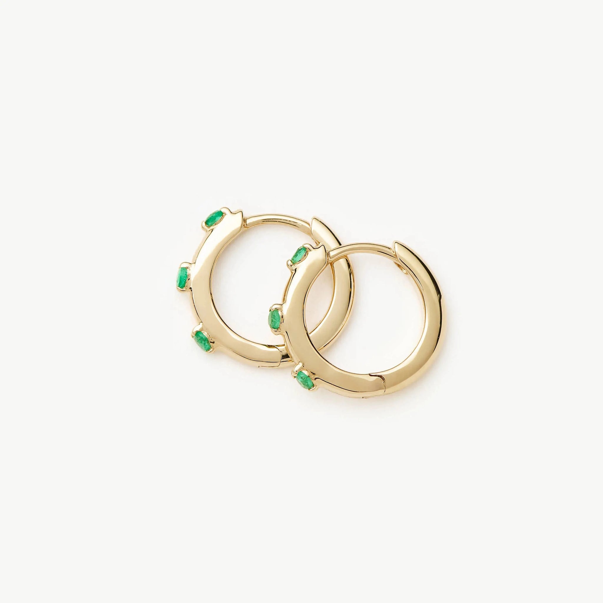 Fine Emerald Studded Huggies | 14ct Yellow Gold Earrings Missoma