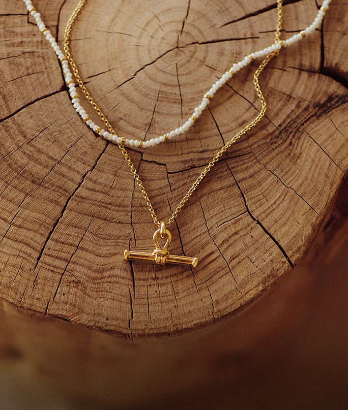 chunky gold t-bar necklace with mini pearl necklace
