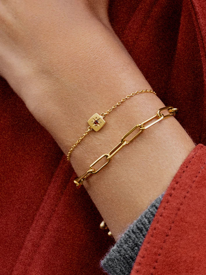gold ring set ripple design with pave detail