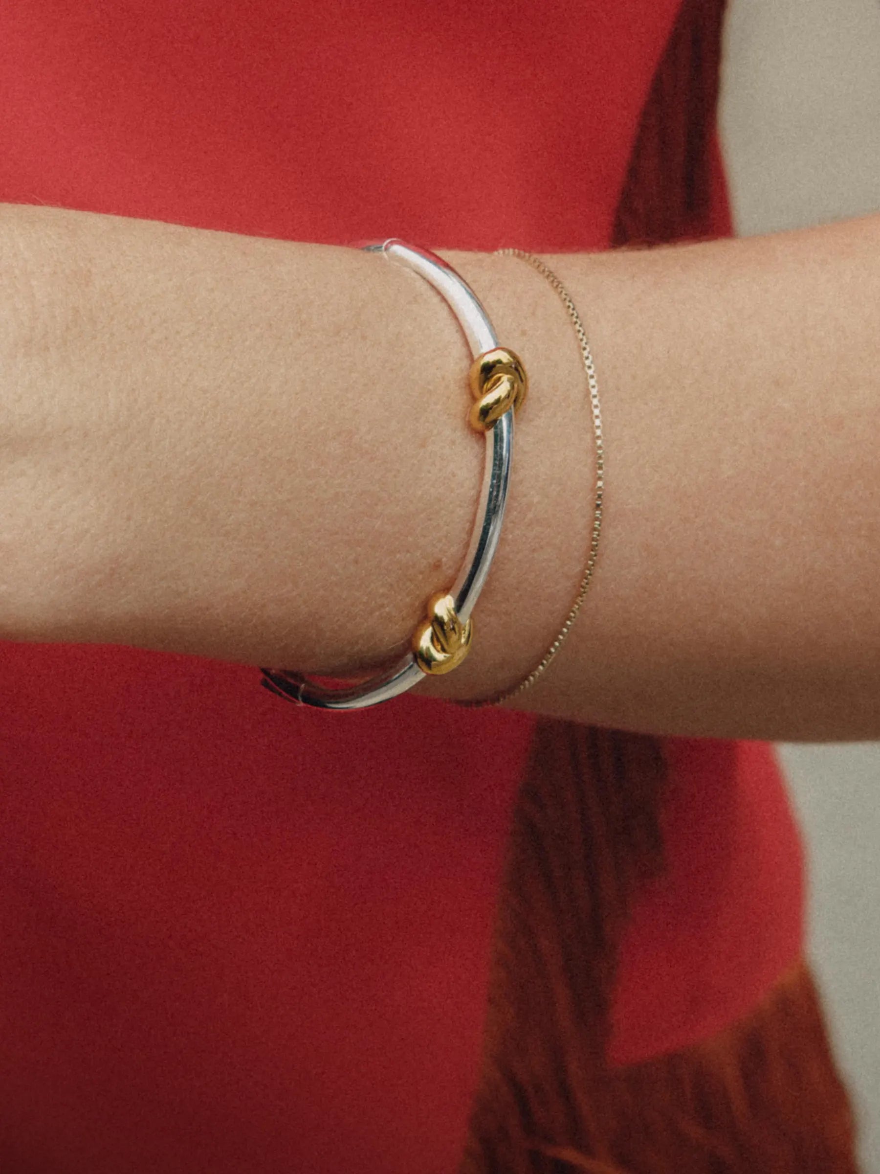 silver and gold knot bangle