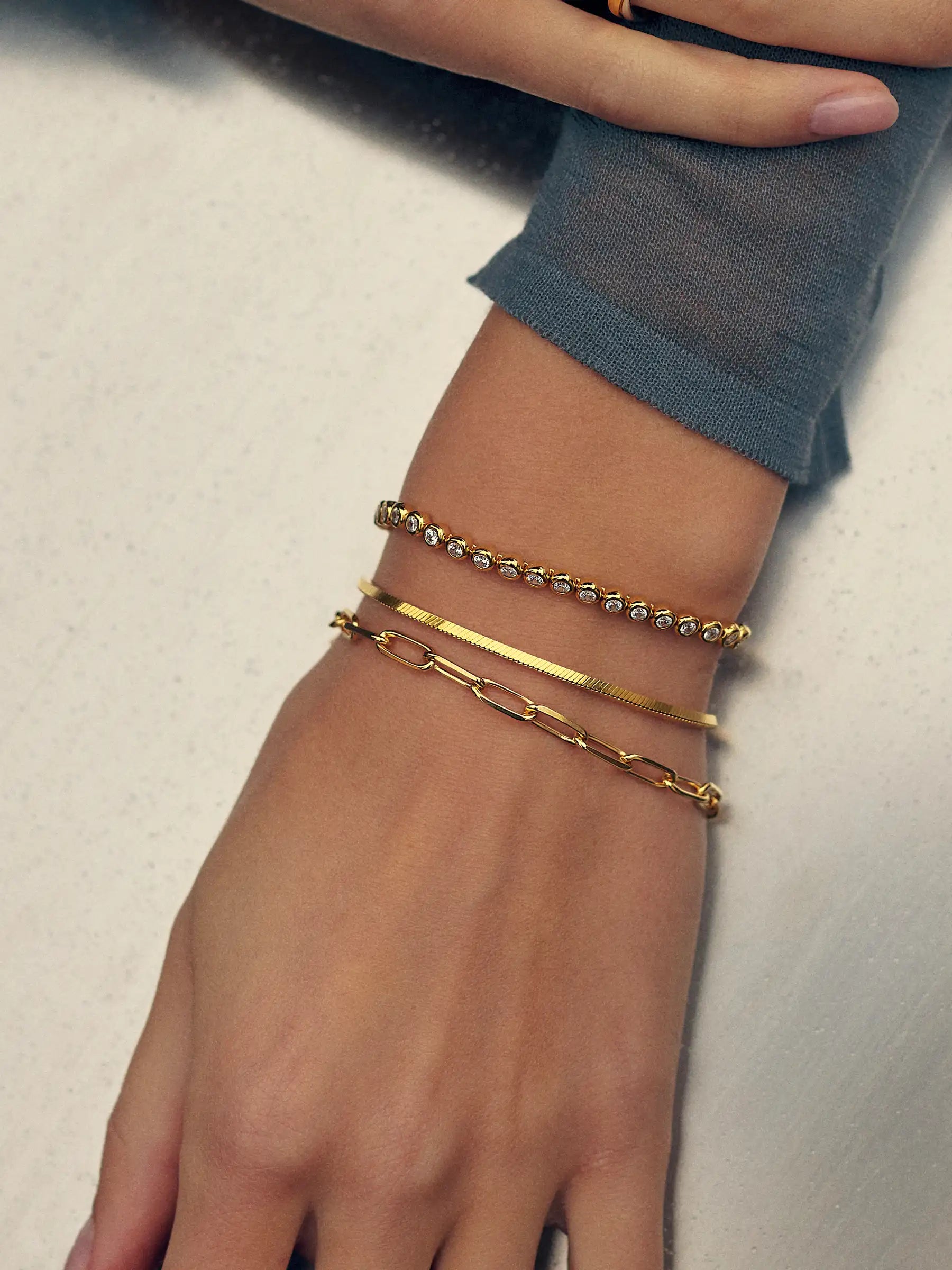 bracelet stack gold snake chain bracelet and gold paperclip chain bracelet