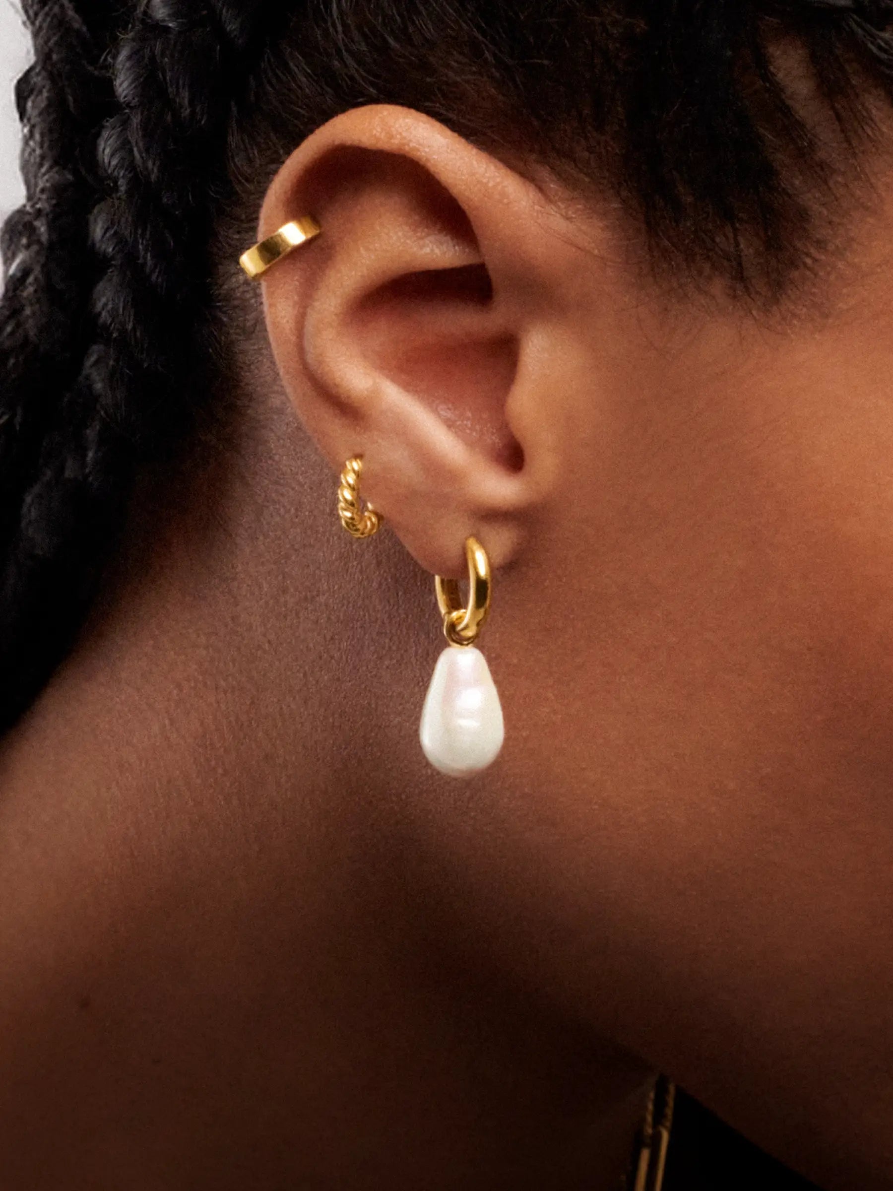 gold hoop with pearl charm