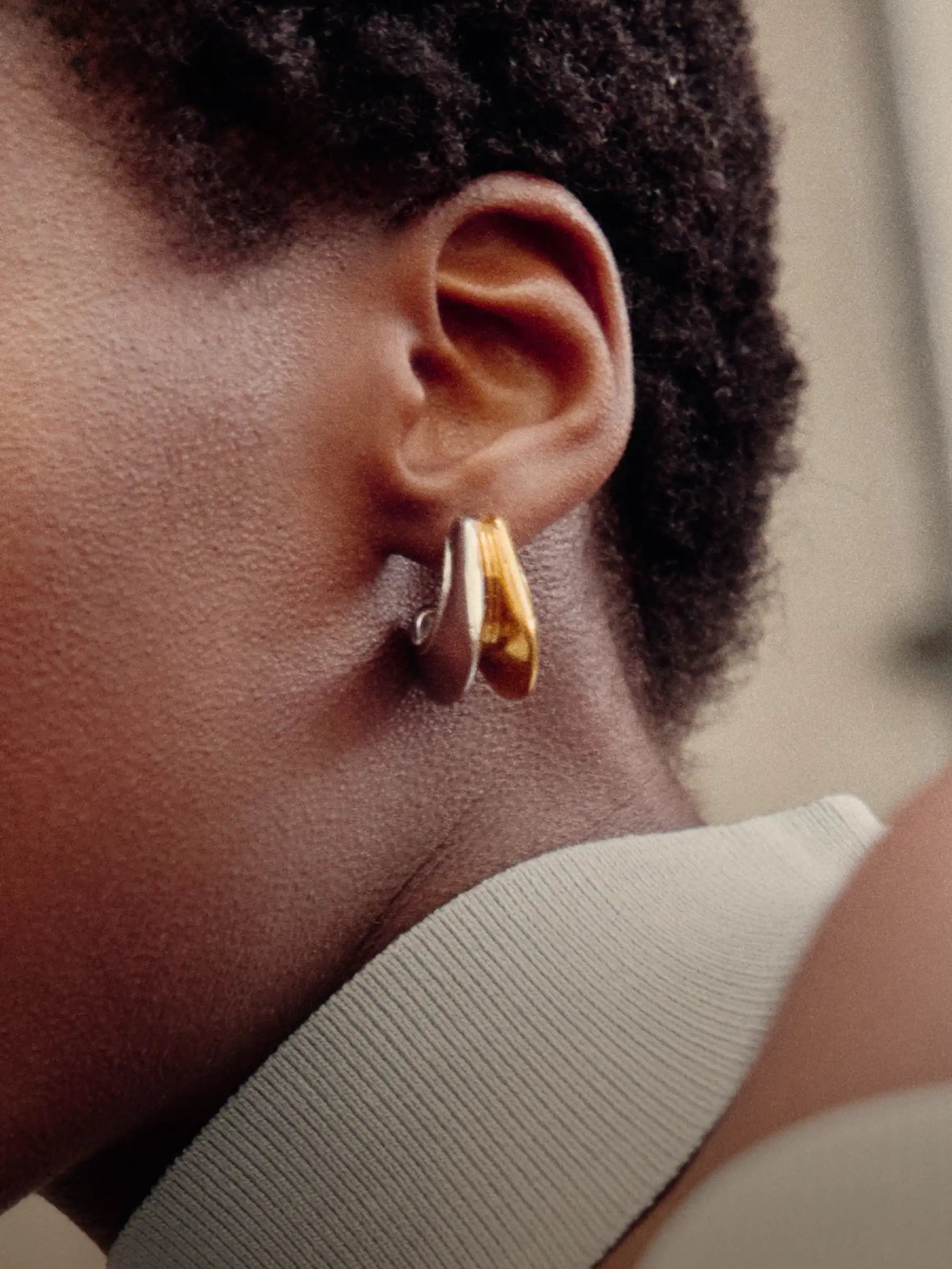 gold and silver hera dome hoop earrings