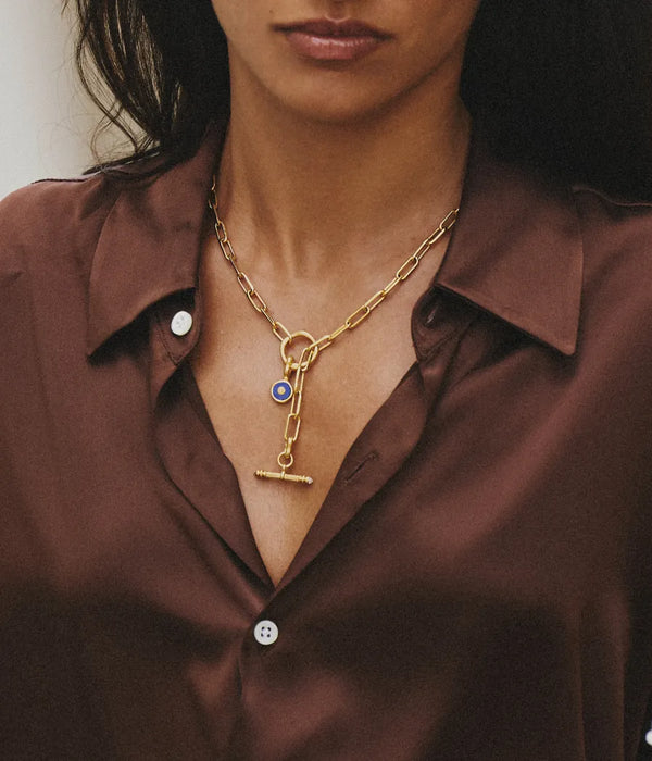 Harris reed gold paperclip interlink chain with t-bar charm and protective eye charm in gold