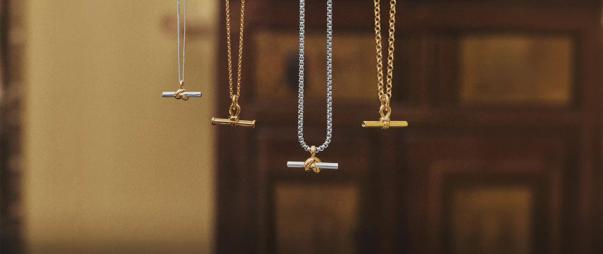 Gold and Silver T Bar Necklaces hanging