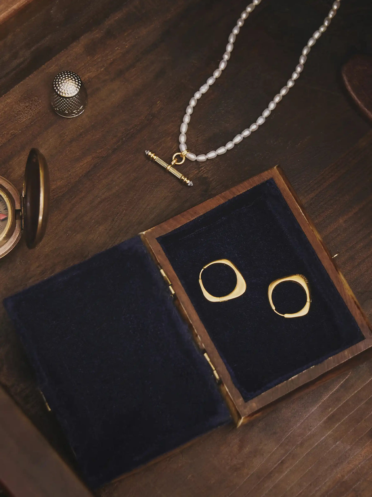 gold ring set ripple design with pave detail