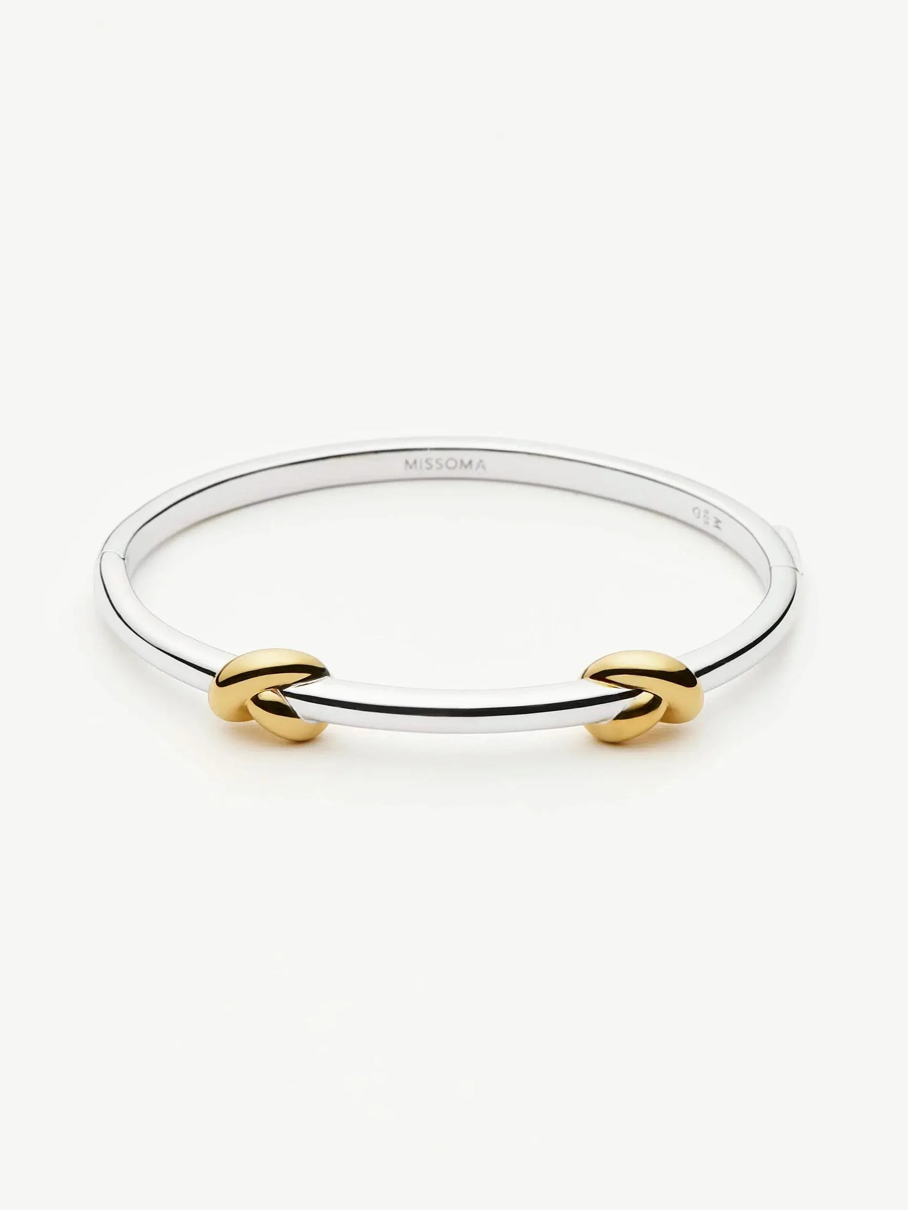 silver and gold knot bangle