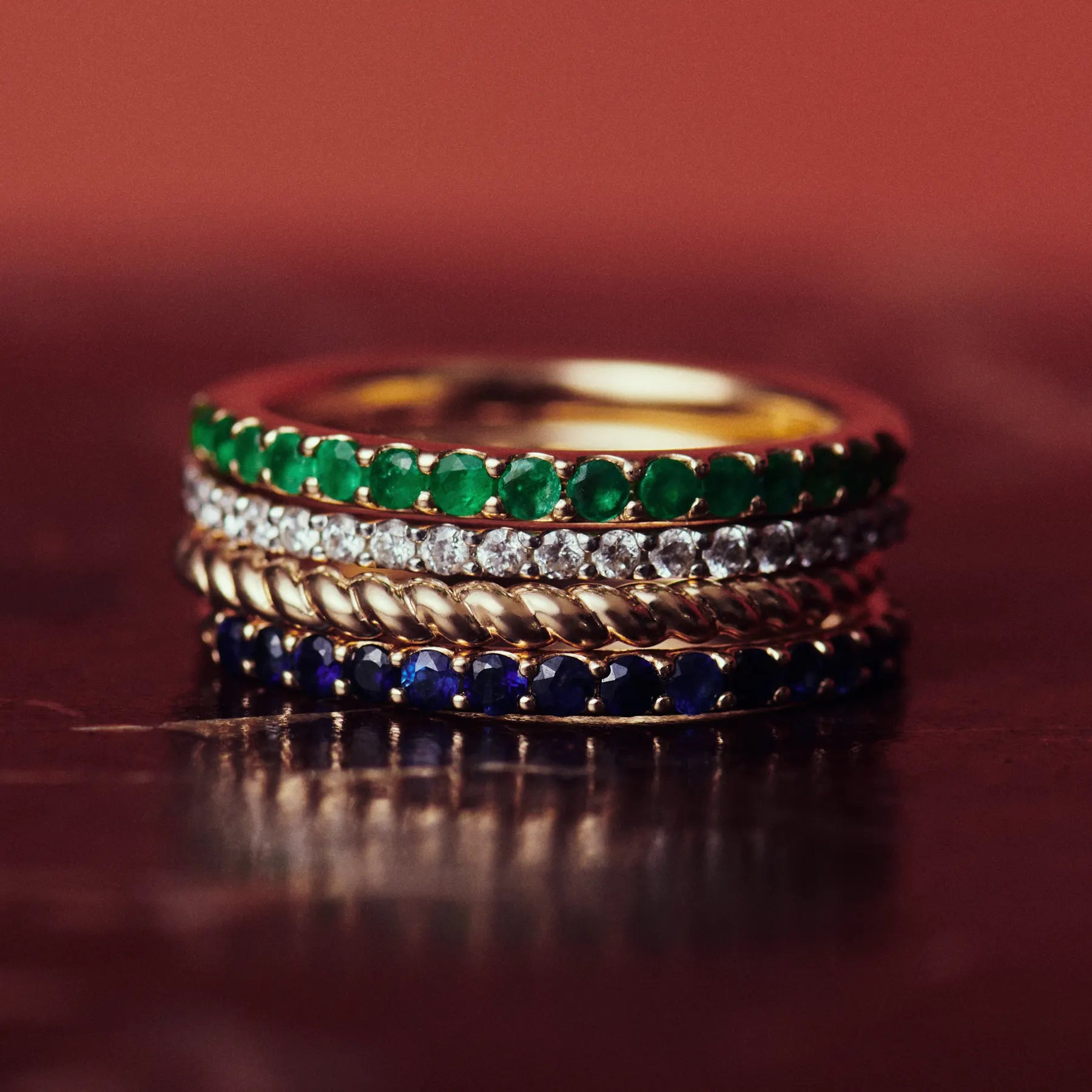 solid gold emerald and diamond ring stack