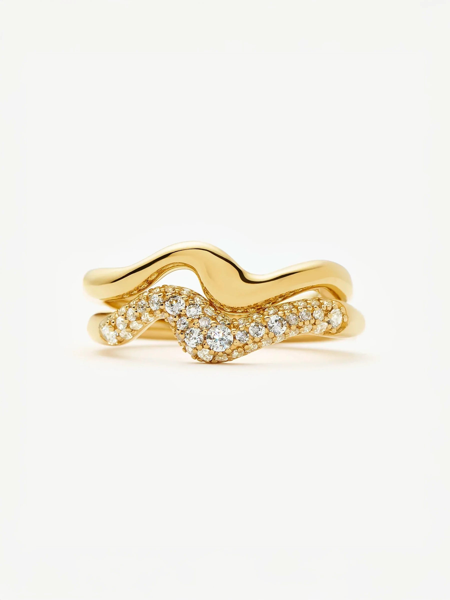 gold ring set ripple design with pave detail