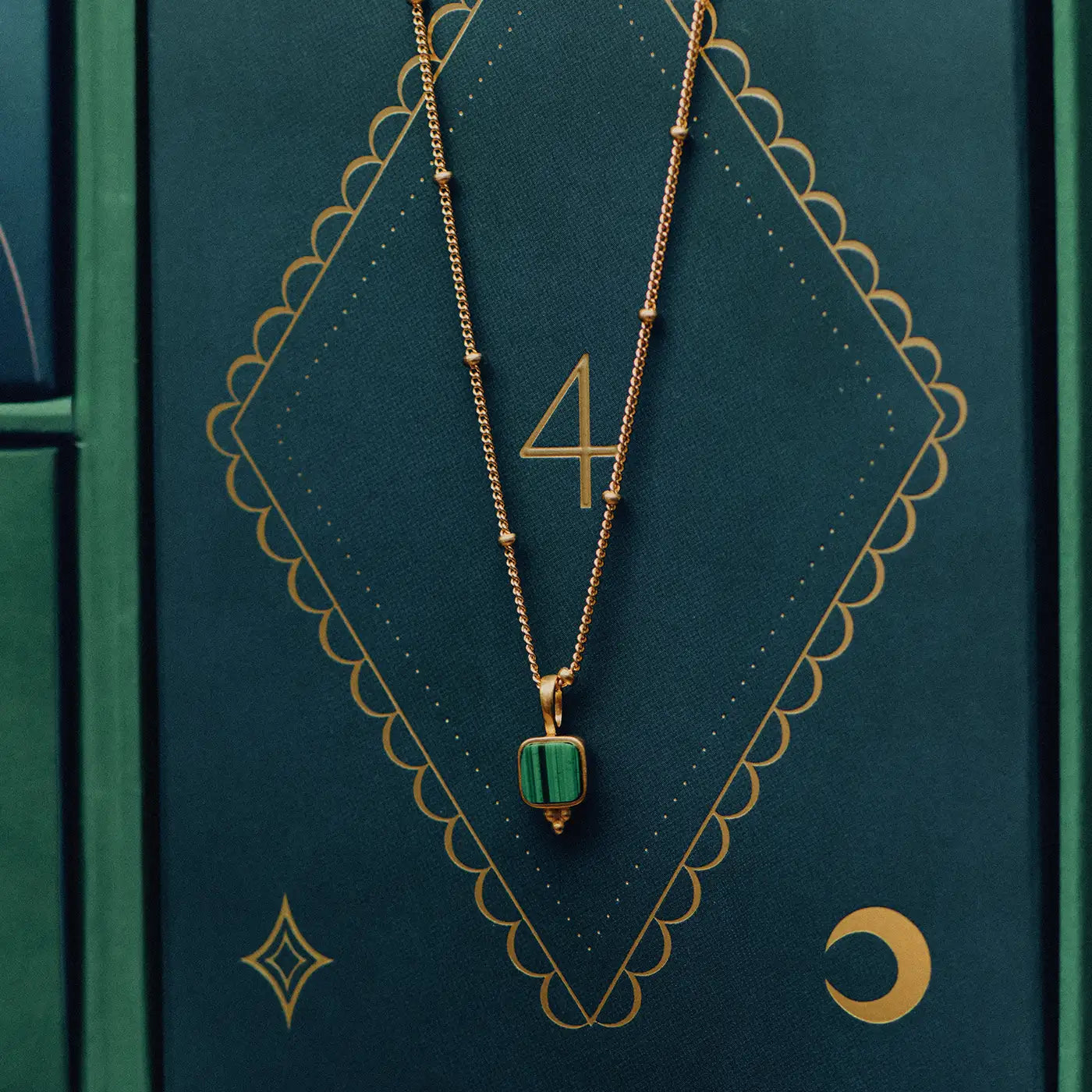 jewellery advent calendar gold with gold malachite square necklace