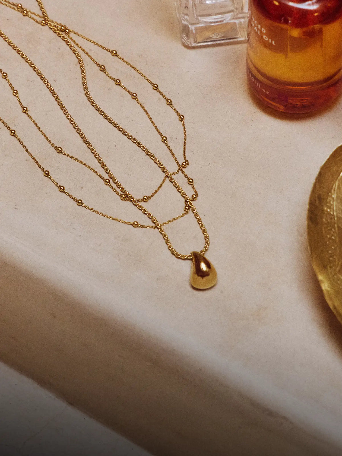 Sculptural Droplet Gold Pendant & Double chain Gold
