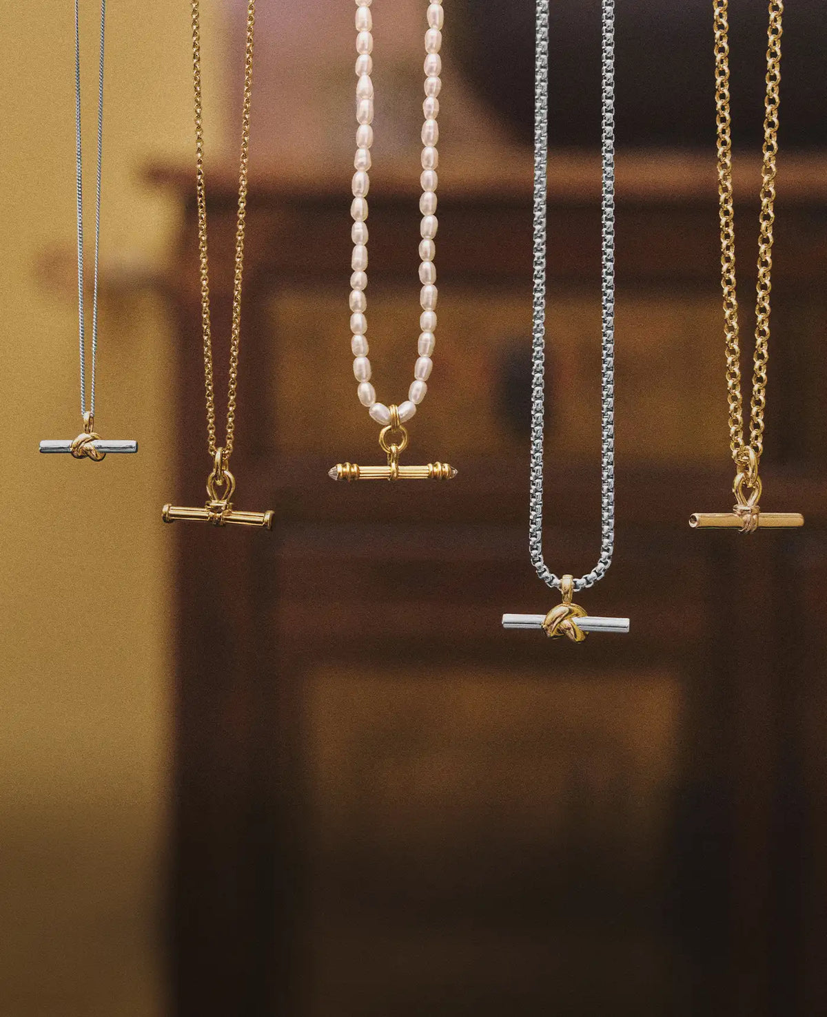 T-Bar necklaces hanging