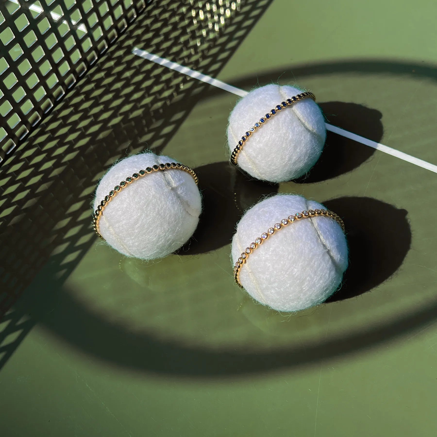 Tennis balls with tennis bracelets