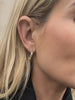 knot gold and silver hoop earrings