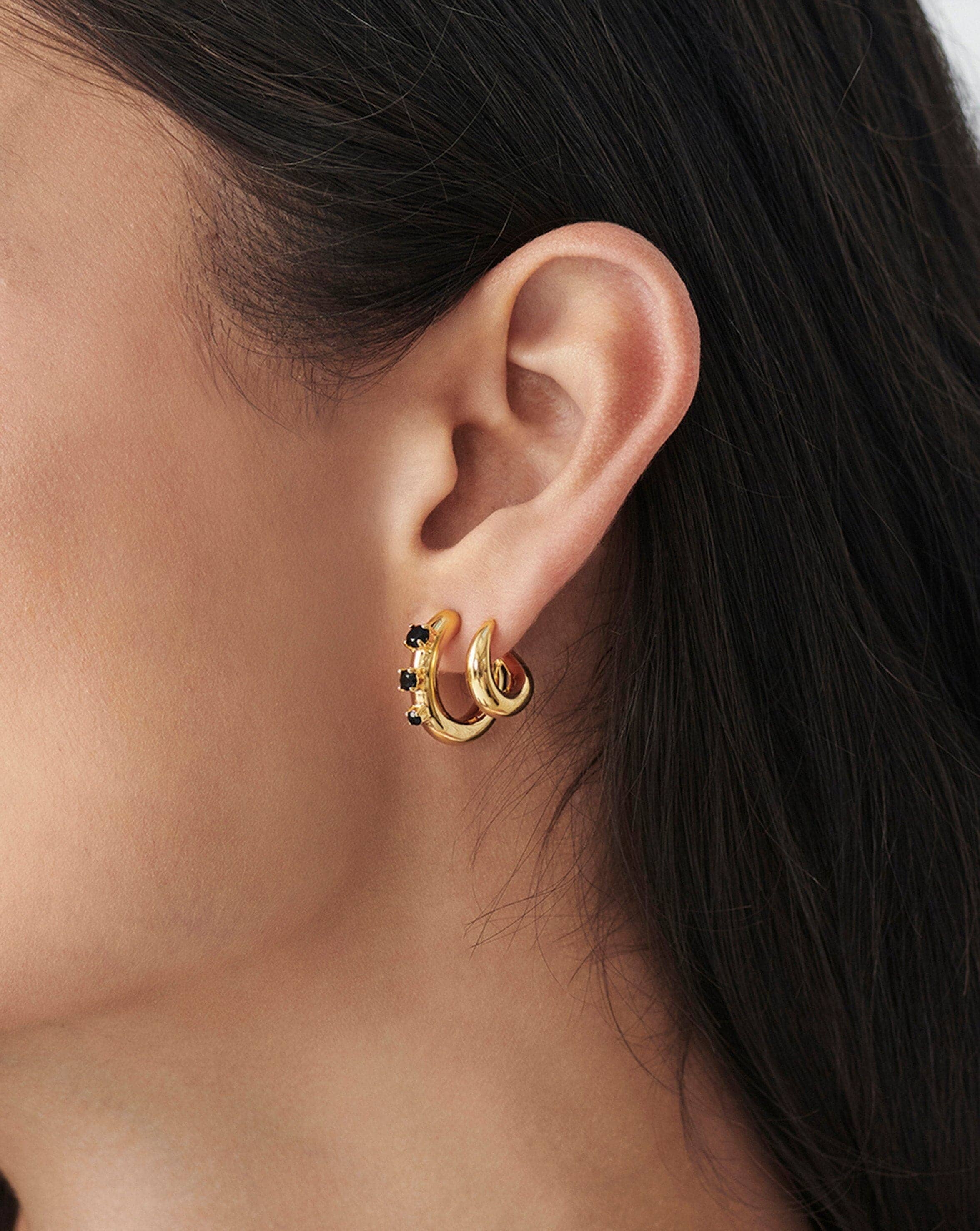 https://www.missoma.com/cdn/shop/products/claw-studded-double-hoop-earrings-earrings-missoma-780656.jpg?v=1679628985&width=2351