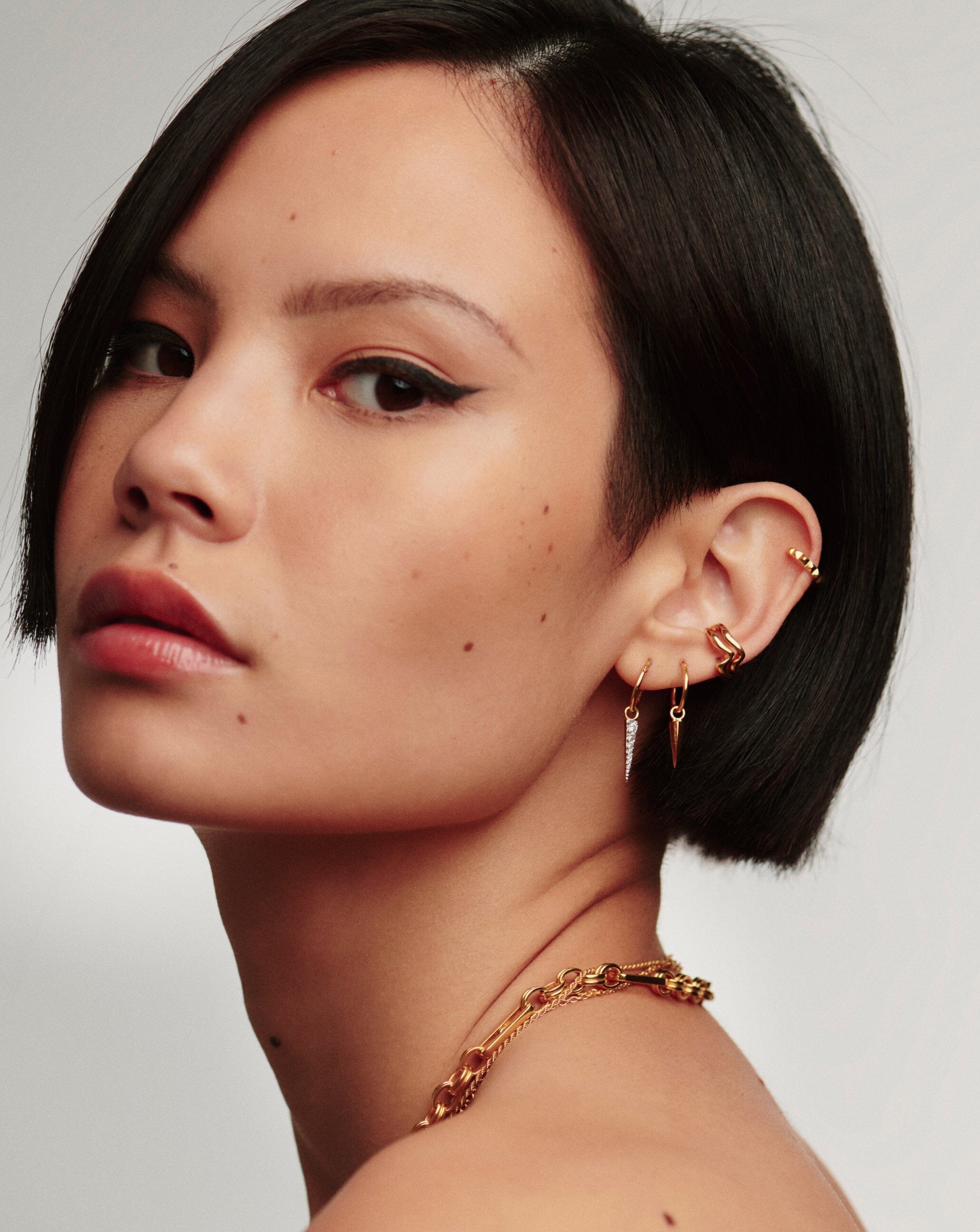 Spike hoop sales earrings gold