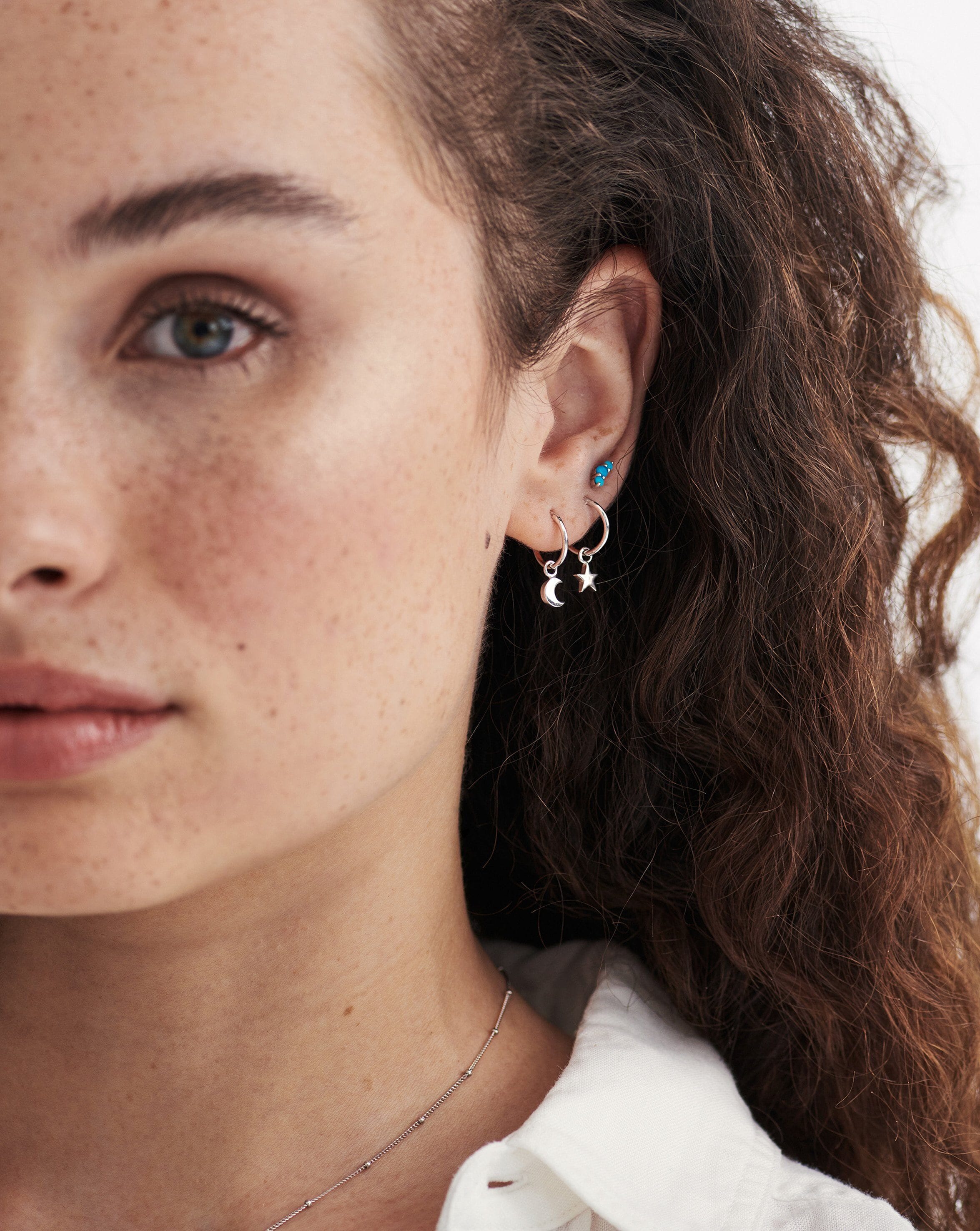 Mini star hoop earrings sales
